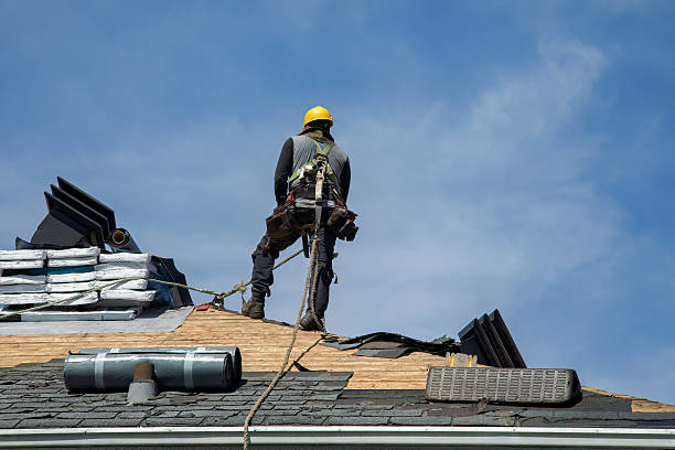 Professional Roof Replacement technician working in Hamilton, NY
